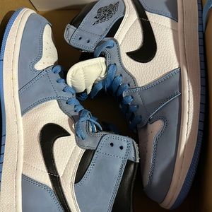 Nice Nike high top blue and white worn once still looks new.